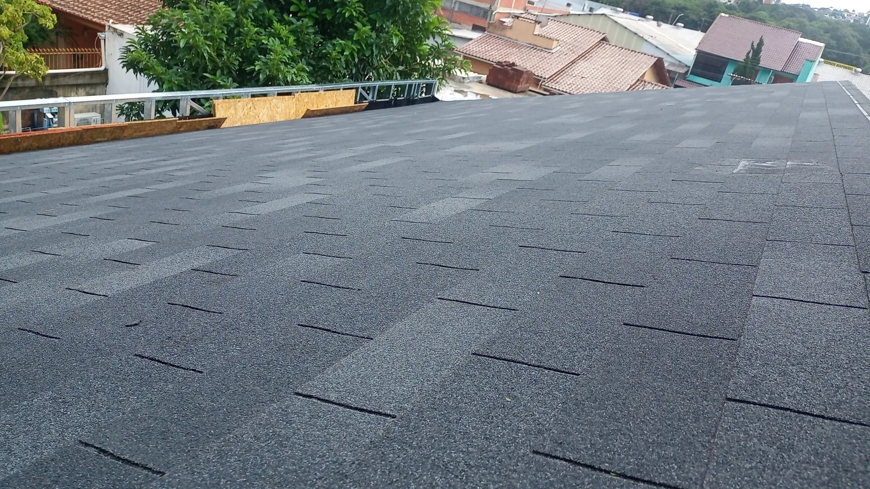 Representação visual de residência com cobertura Shingle